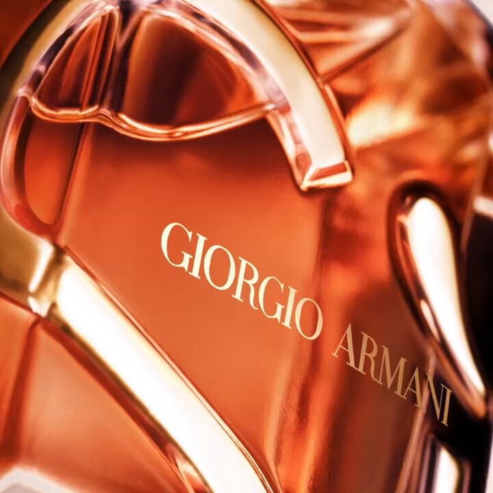 A video for Giorgio Armani Si perfume. Features close-ups of the amber bottle with its golden "Si" design, falling rose petals. Cate Blanchett, smiling and confident, embodies the fragrance's message of saying "Si" to life, passion, and new beginnings. Highlights both EDP and new Parfum.