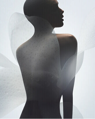 Cinematic silhouettes resembling Armani/Prive haute couture. 