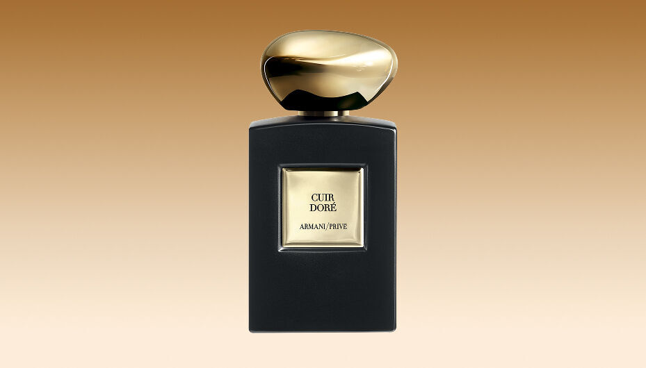 Armani/Prive Cuir Dore fragrance bottle with matte black finish and precious golden cap.