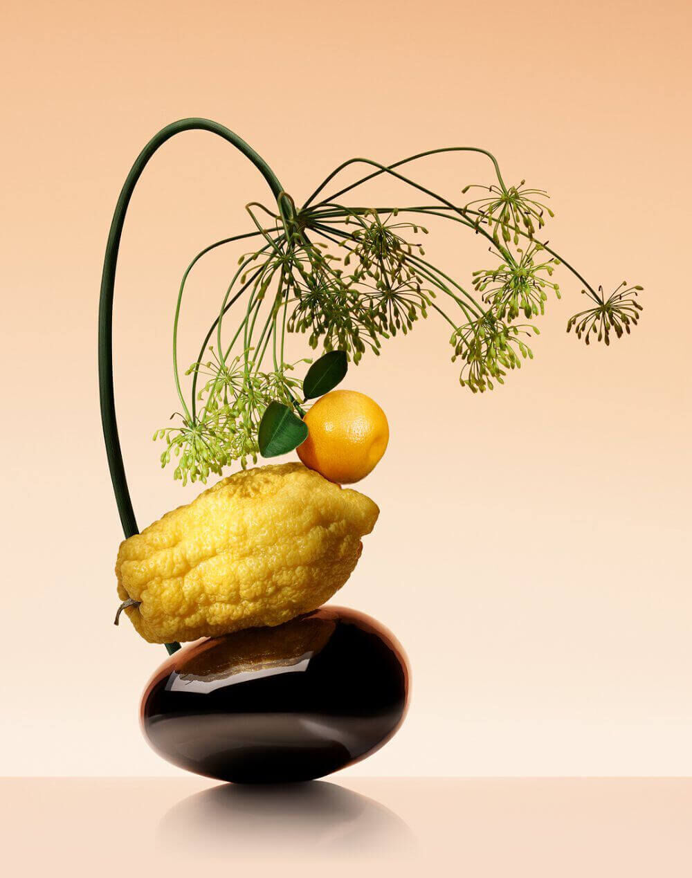 Armani/prive Orange Mediterranee: artistic ikebana arrangement with cedrat, bitter orange and fennel, set against an elegant gradient background.