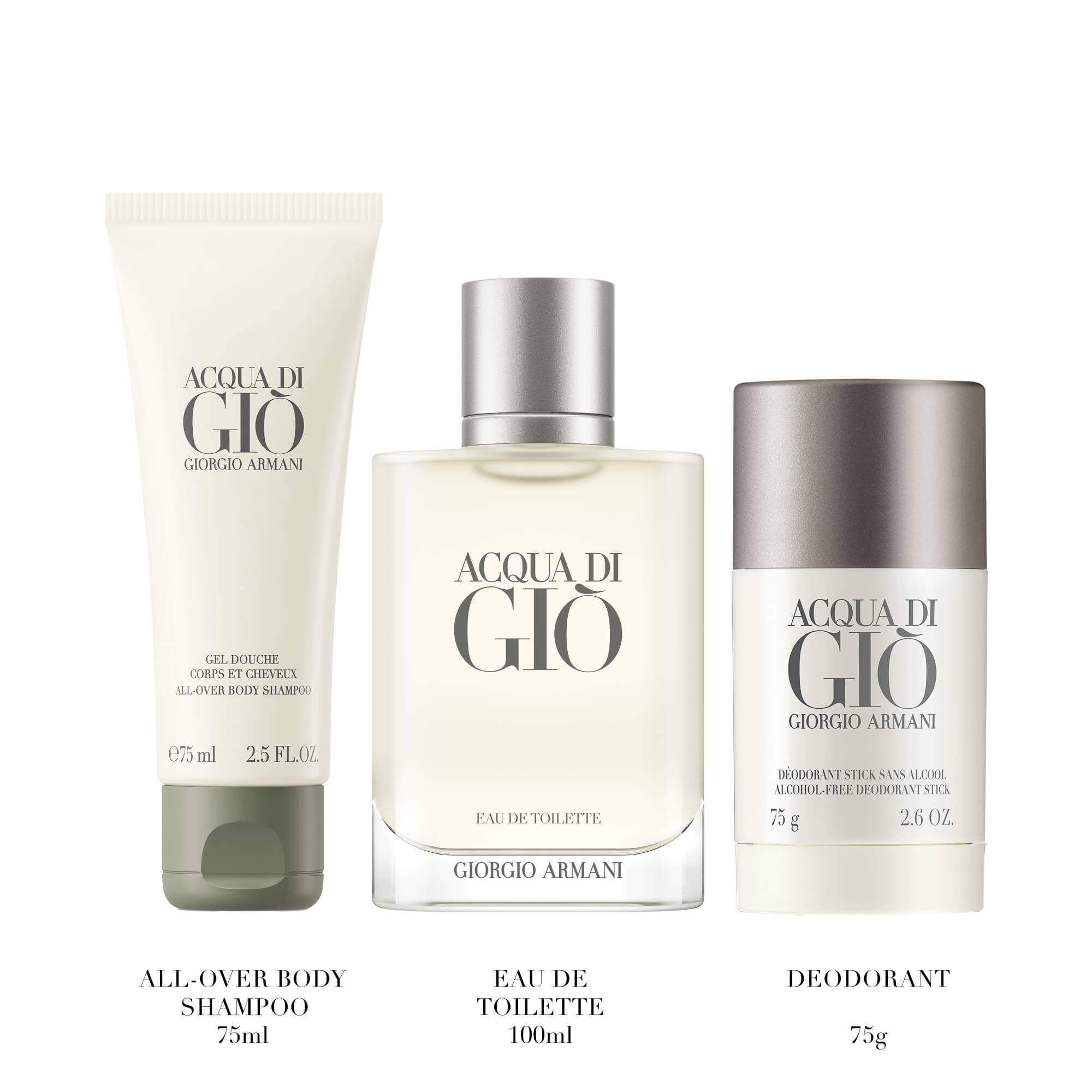 Giorgio Armani Acqua di Gio Eau de Toilette 100ml gift set — signature bottle, All-Over Body Shampoo 75ml and Deodorant Stick 75g displayed side by side on a pale surface.