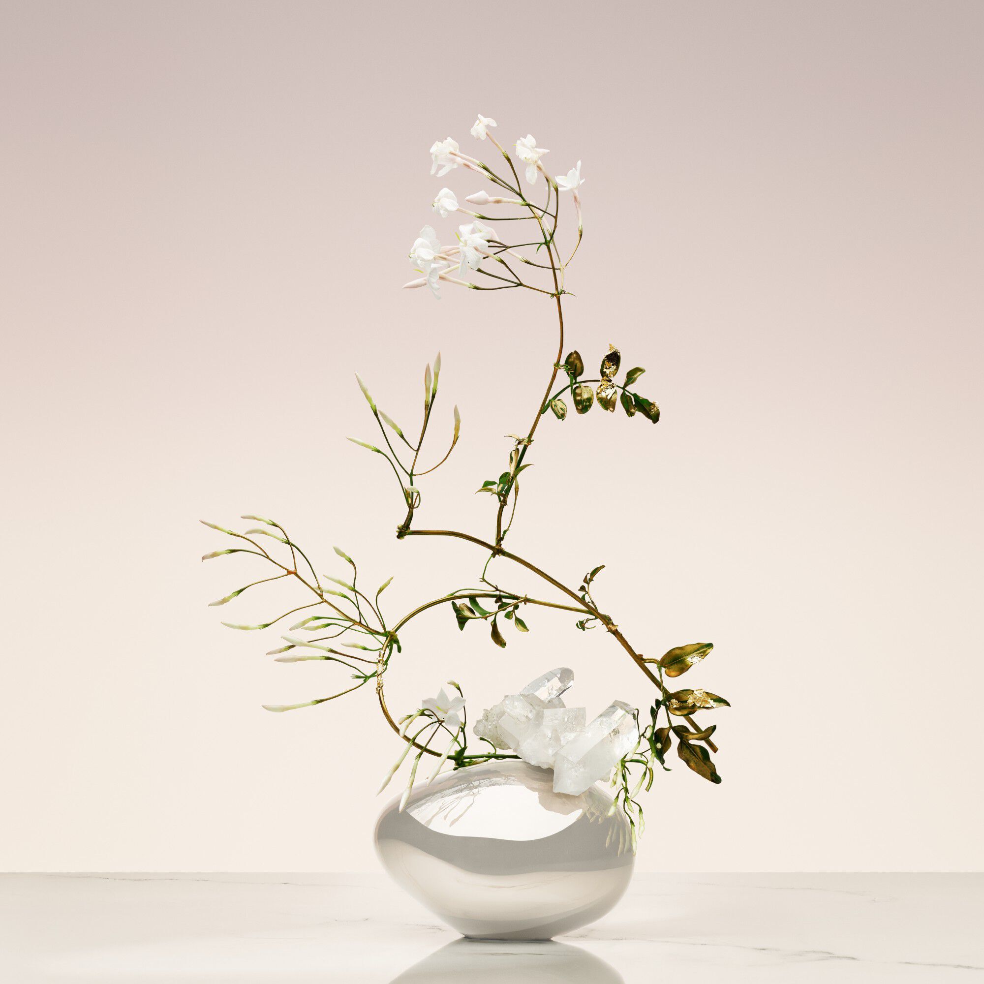 Armani/Prive Blanc Kogane: artistic ikebana arrangement with delicate white florals, evoking purity and elevated craftsmanship.