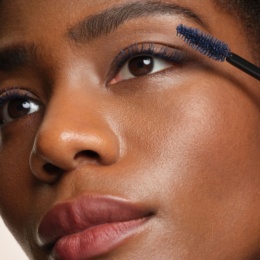 Applying Armani Beauty  VERTIGO DRAMA MASCARA to lift and define the lashes