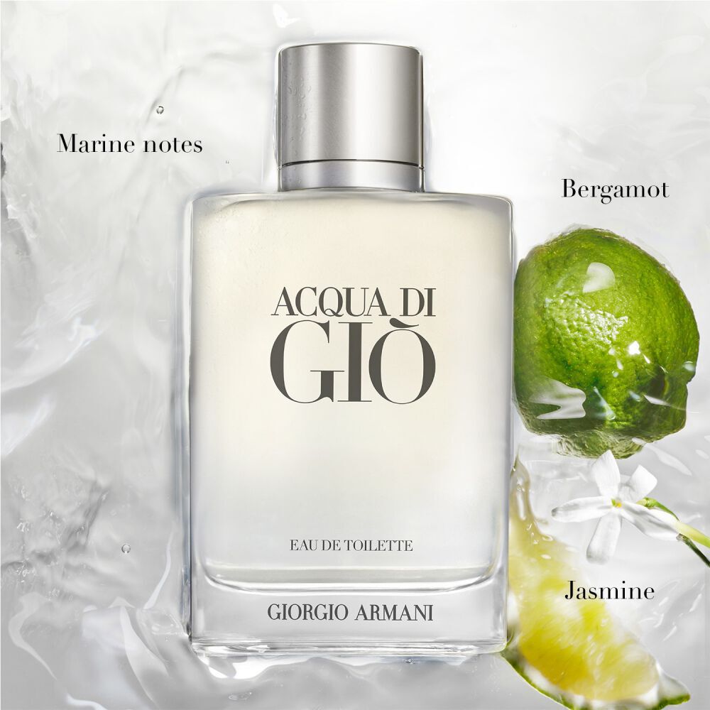 Giorgio Armani Acqua di Gio Eau de Toilette — clear glass signature bottle emerging from icy water with fresh lime and aquatic elements, evoking the freshness of the Mediterranean sea.