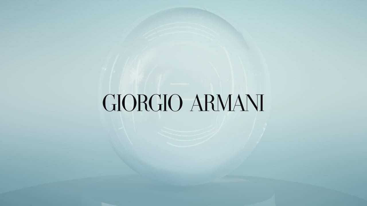 A sleek, futuristic design featuring the text 'Giorgio Armani' against a soft gradient background.